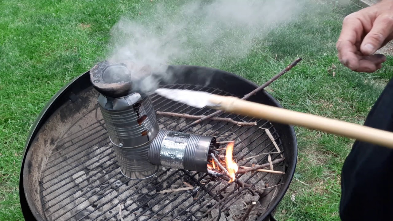 Hafting a chert projectile point into a river cane spear shaft using pine resin epoxy.