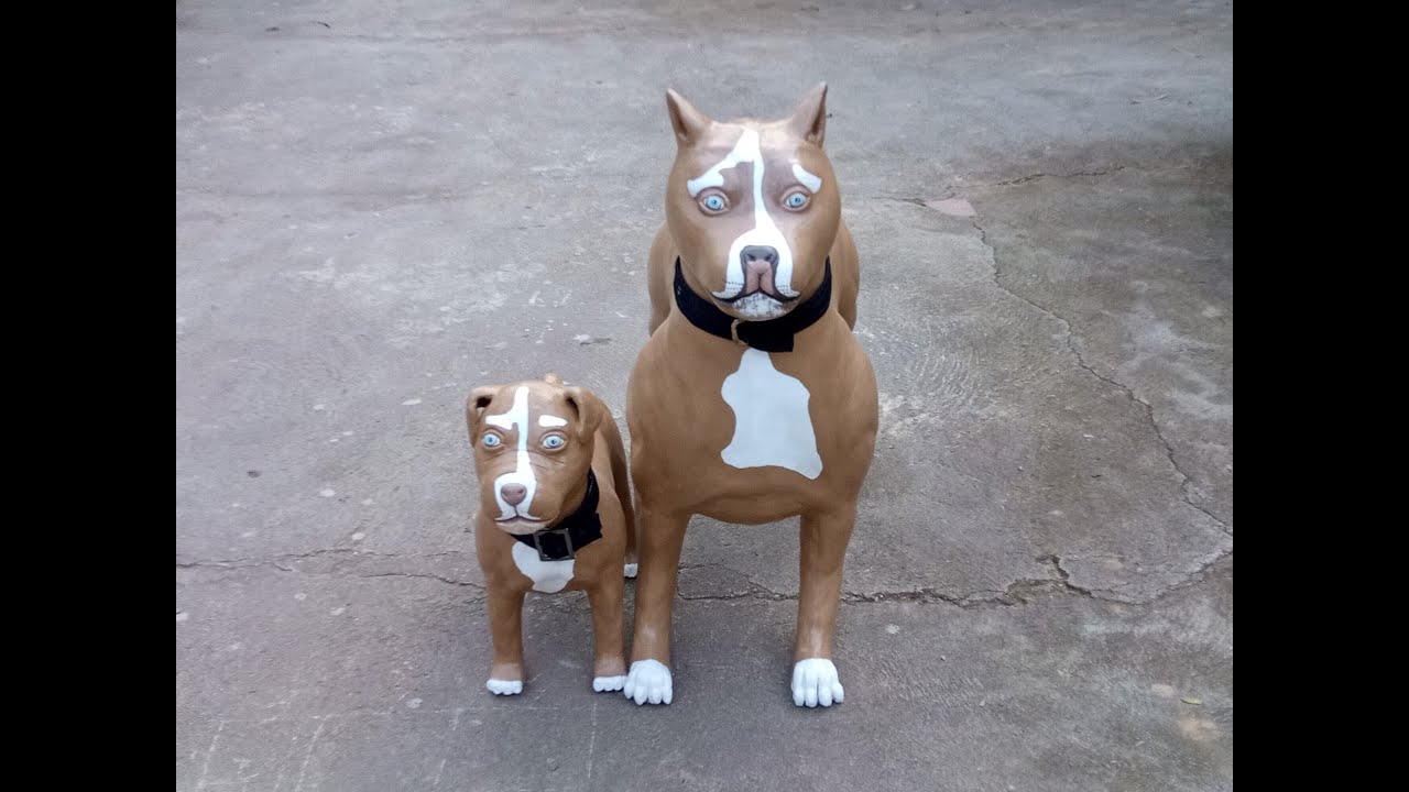 Cachorro pitbull de cimento