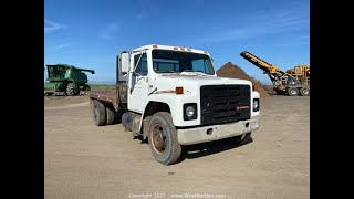 Lot 01-0104: 1986 International S1600 16’ Stake/Flatbed Truck