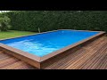 Piscina di libera installazione con solarium in legno pregiato | Semplicemente Piscina