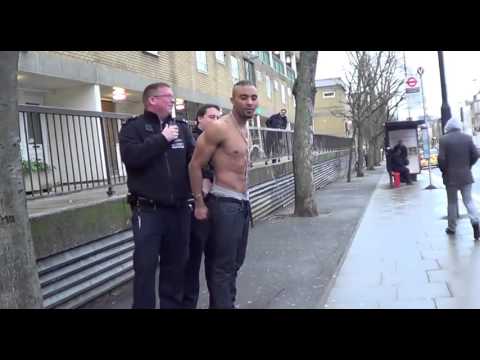 Crazy guy pees like a fountain during arrest - what is going on here?