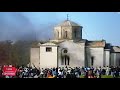 Albanian muslims burning serbian church in kosovo