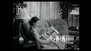 1940s Woman Reads Newspaper