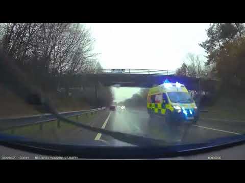 Two West Midlands Ambulance Service vehicles 999 emergency response A483 near Oswestry Salop 20.2.26