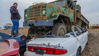 Driving a 6x6 Army Truck Over Cars!