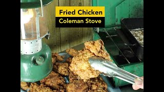 Quiet video, cooking cast iron fried boneless chicken thighs on vintage coleman stove. no talking