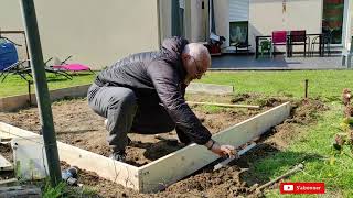 coffrage, afin de réaliser une dalle béton pour un abri de jardin