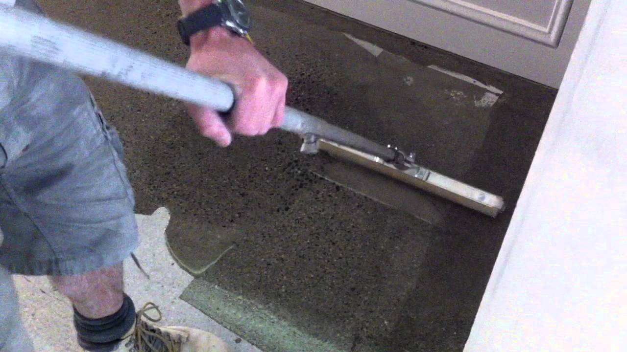 Rolling Out Polyurethane Onto Concrete Flooring Youtube
