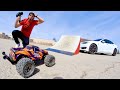 RC TRUCK JUMP OVER A TESLA.