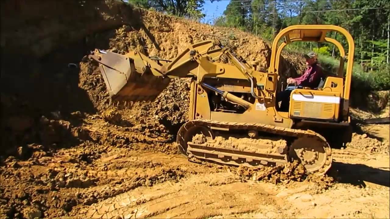 Compass Auctions Real Estate Auction Dresser 125e Dozer