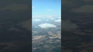 I am flying among the clouds.