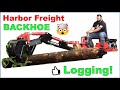 Harbor Freight Backhoe moving heavy logs