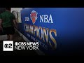 Workers hard at work creating floats for Knicks' championship parade