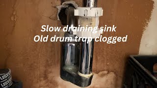 Sink draining slowly. Old drum trap clogged