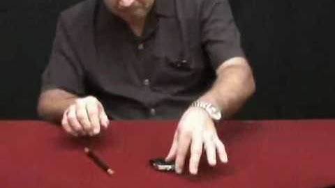 Tango Ultimate Coin (T.U.C) Half dollar with instructional DVD by Tango - Trick