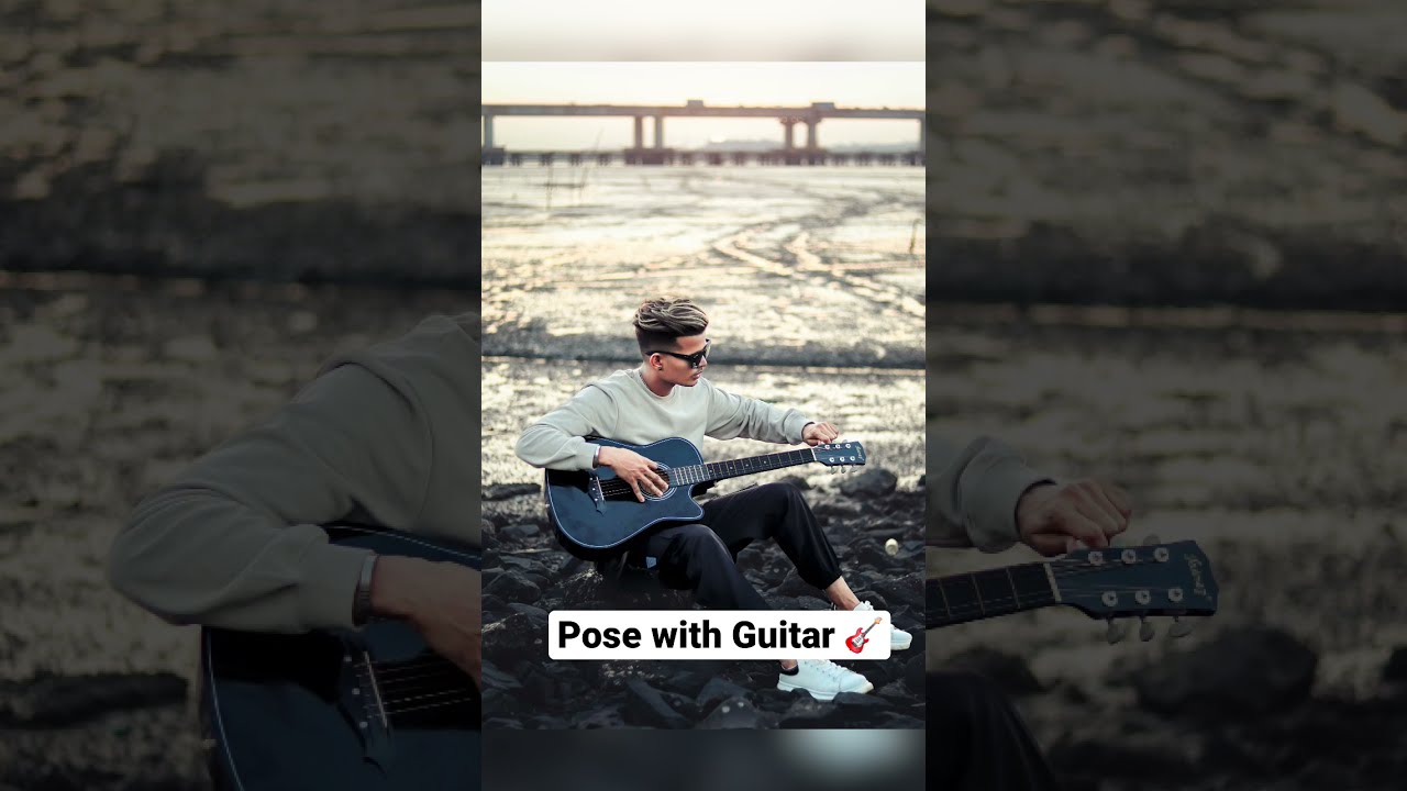 Arijit Singh with Guitar in hand thinking pose in pi...