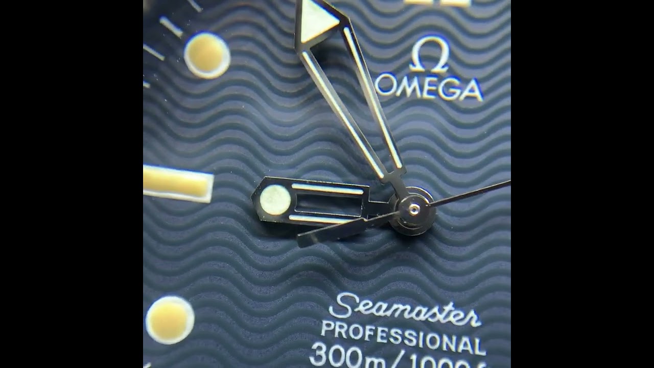 SOLD: Omega Seamaster Pro 300M "Goldeneye" Ref. 2541.80.00 close-up dial shot