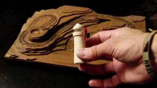 An Improvement to www.cribscapes.com Lighthouse 3D wood cribbage game. Micro Led hidden in the solid wood lighthouse!