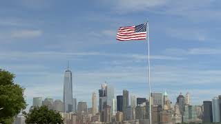 American flag waving and East River view over Manhattan New York City Skyline in beautiful screenshot 3