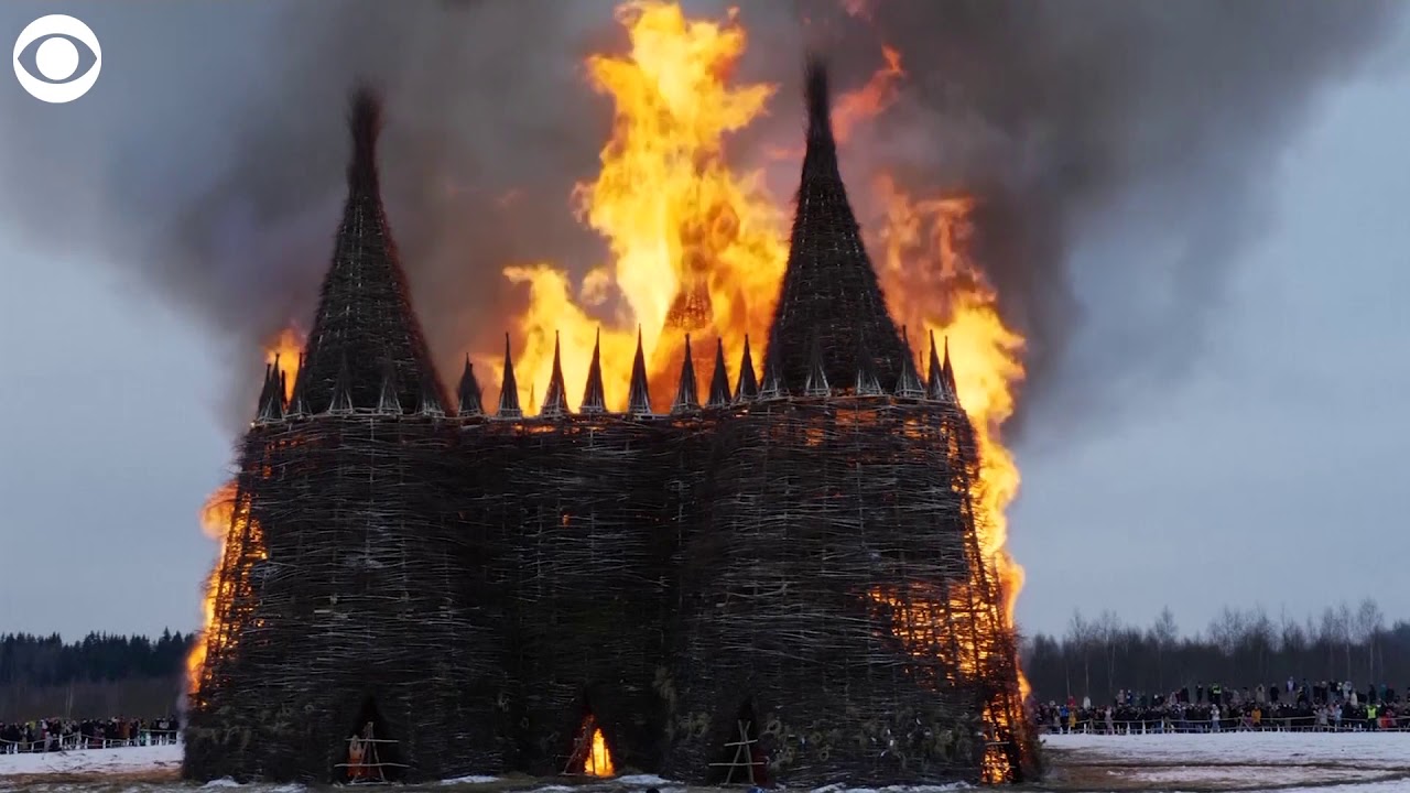 Wooden castle burned down to symbolize "destroying" COVID