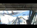 Riding the St. Moritz funicular down from the top.