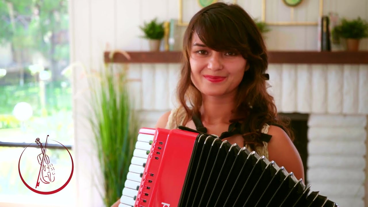 Accordionist Melinda performing live accordion music