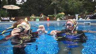 Students first breaths on SCUBA in Tallahassee instructor Gabrielle's class