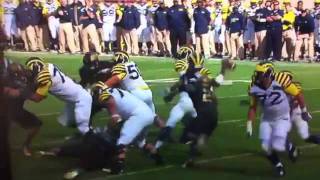 William Gholston has his head pinned to the ground by U-M's Taylor Lewan no penalty 2011