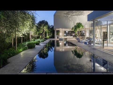 Videó: Minimalista ház N Izraelben Érdekes építészeti részletek megjelenítése