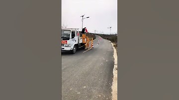 Roadway Guardians: Automated Isolation Barrel Installation