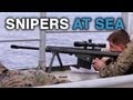 Usmc snipers shooting the ultra powerful barrett m82 at target boat