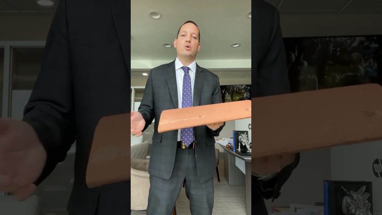 Roof Tile Almost Kills A Man