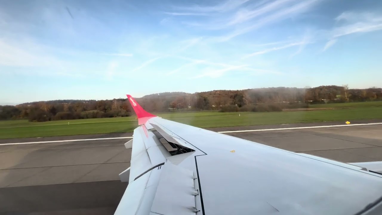 LX1073 Helvetic Embraer E195 touching down into ZRH | HB-JVW