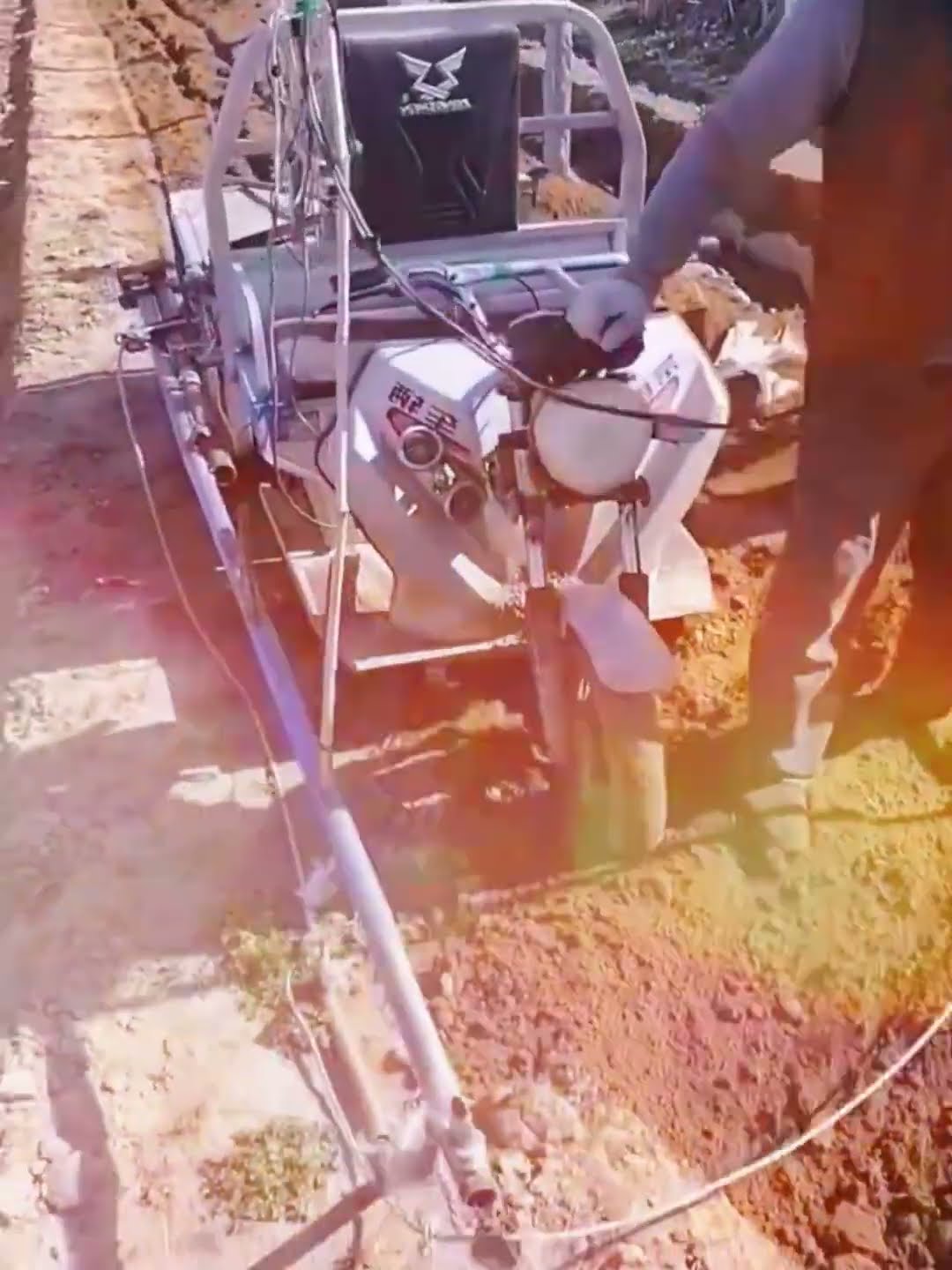 Tricycles assist in the raking process- Good tools and machinery make work easy