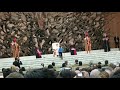 Child runs around during Pope's blessing.