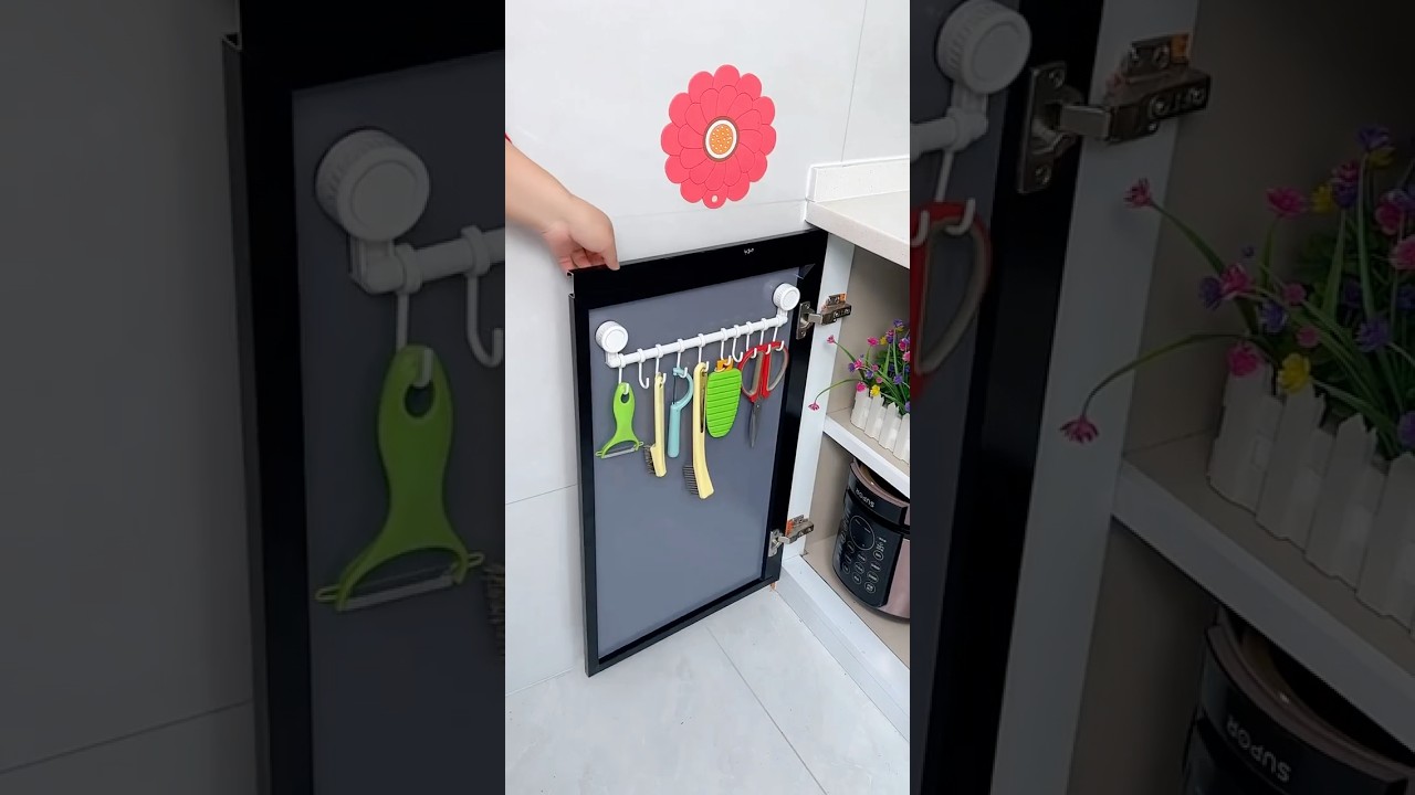 The kitchen is always messy, so just install a row of wall hooks to hang all sorts of small tools