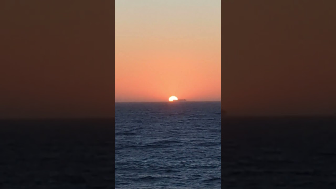 blooper 🛳️| A ship sails through my final sunset of 2023