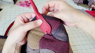 How to attach the leather bag handles.