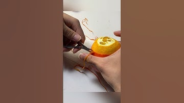 cắt vỏ quýt thành sợi dây dài