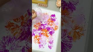 Spring creative painting Use a fresh-keeping bag to print a spring-themed creative painting.
