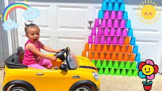 Pretend Play With Colored Cups and Ride On Power Wheels Car Toy.