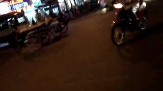 Vietnam Crossing The Street At Night In Saigon