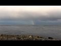 Single rainbow, not very far across the sky.