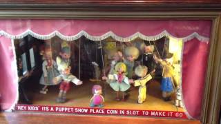 Random puppet show machine in England
