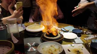 Rice on fire at Juqi restaurant in Beijing
