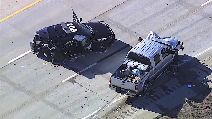 Sky 5 shows OHP vehicle badly damaged after pickup driver hits trooper on I-40 in Oklahoma City