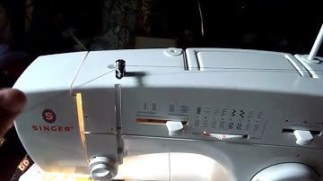 Como cargar el carretel de hilo en una maquina Singer Florencia 69 1/3