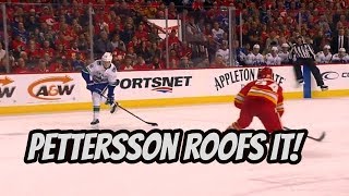 Elias Pettersson rips it top corner past Rittich
