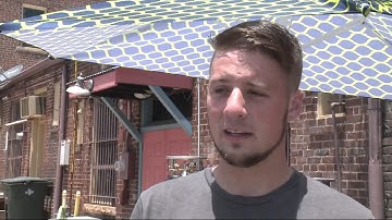 Kilt-wearing man makes threats from roof