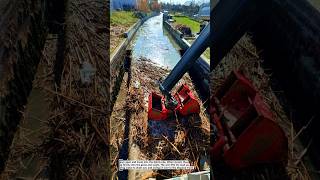 Machine Clearing Debris from Waterway!